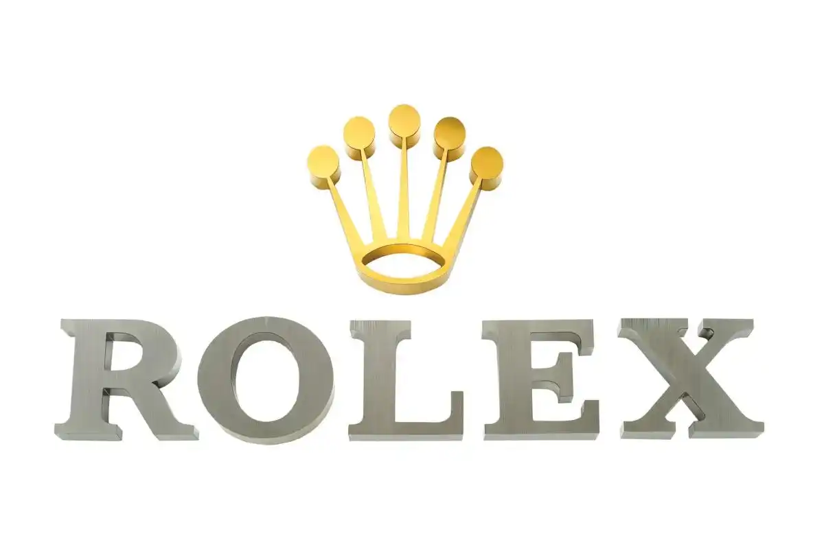 Metal letters with raised gold lettering and crown logo
