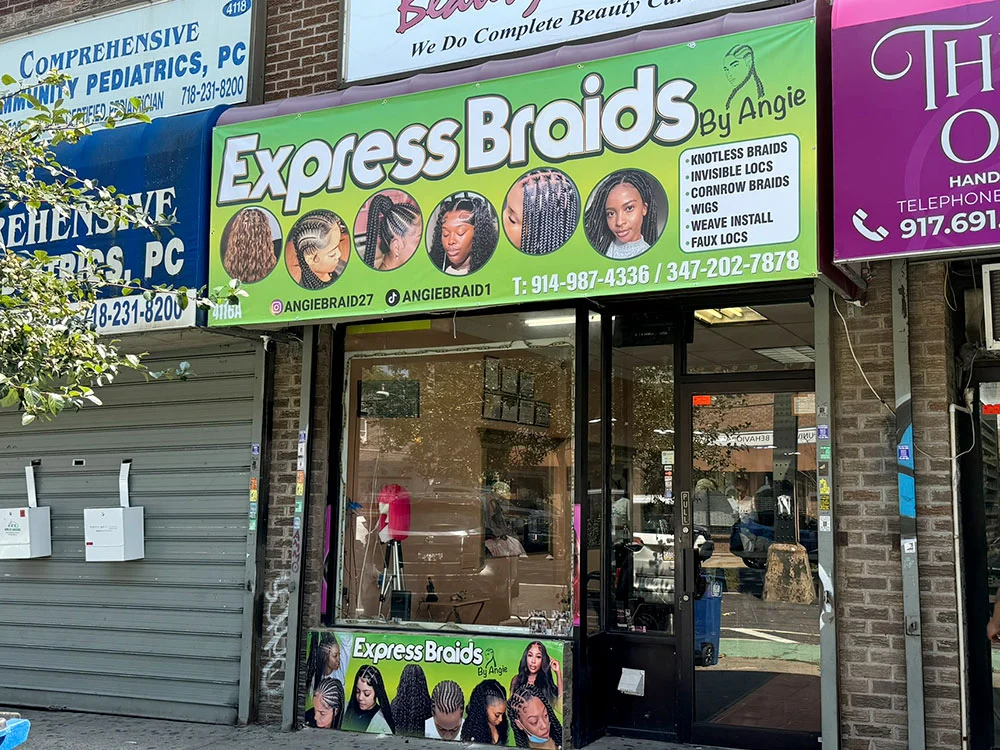 Beauty salon awning with storefront branding